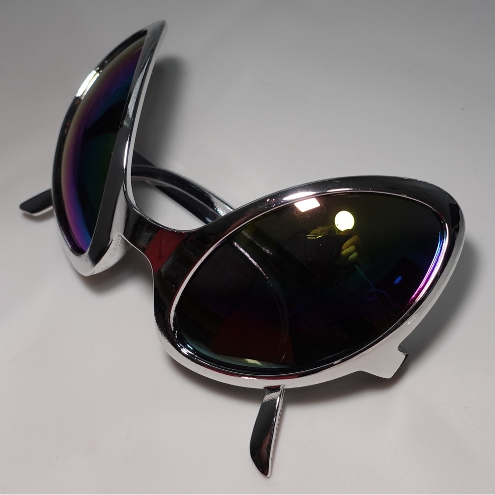 Futuristic Silver Sunglasses with Dark Lenses